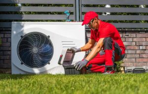 Quality Degree technician servicing an HVAC system