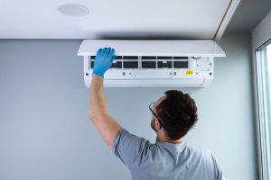 heating/AC unit being inspected